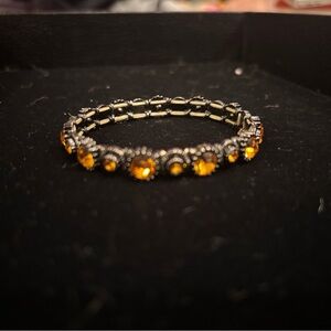 Elegant Gold and Orange Bracelet